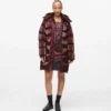 Lange Pufferjacke mit Perlmuttglanz Lange Pufferjacke mit Perlmuttglanz
