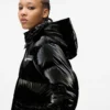 Lange Pufferjacke mit Perlmuttglanz Lange Pufferjacke mit Perlmuttglanz
