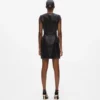 Lederkleid mit Knopfdetails Lederkleid mit Knopfdetails