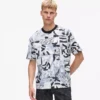 Lässiges T-Shirt mit durchgehendem Monogramm-Print Lässiges T-Shirt mit durchgehendem Monogramm-Print