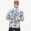 Lässiges T-Shirt mit durchgehendem Monogramm-Print Lässiges T-Shirt mit durchgehendem Monogramm-Print