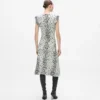 Strickkleid mit Schneeleopardenmuster Strickkleid mit Schneeleopardenmuster
