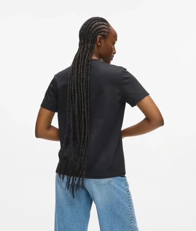 T-Shirt mit Nieten und Signatur T-Shirt mit Nieten und Signatur