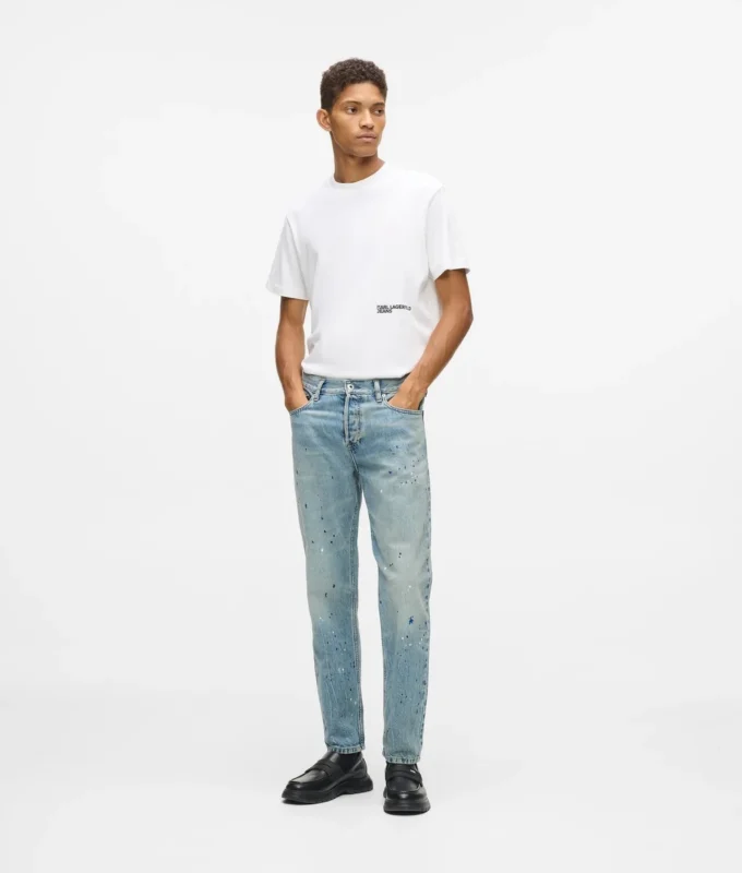Tapered Jeans mit Farbspritzern Tapered Jeans mit Farbspritzern